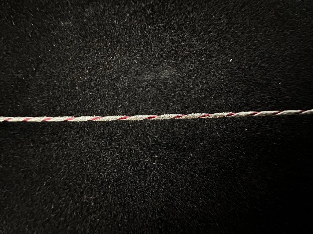 Thread coated diamond wire loop